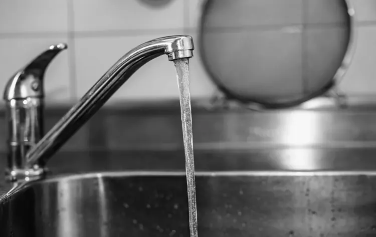 Limescale buildup on faucet from Irish hard water